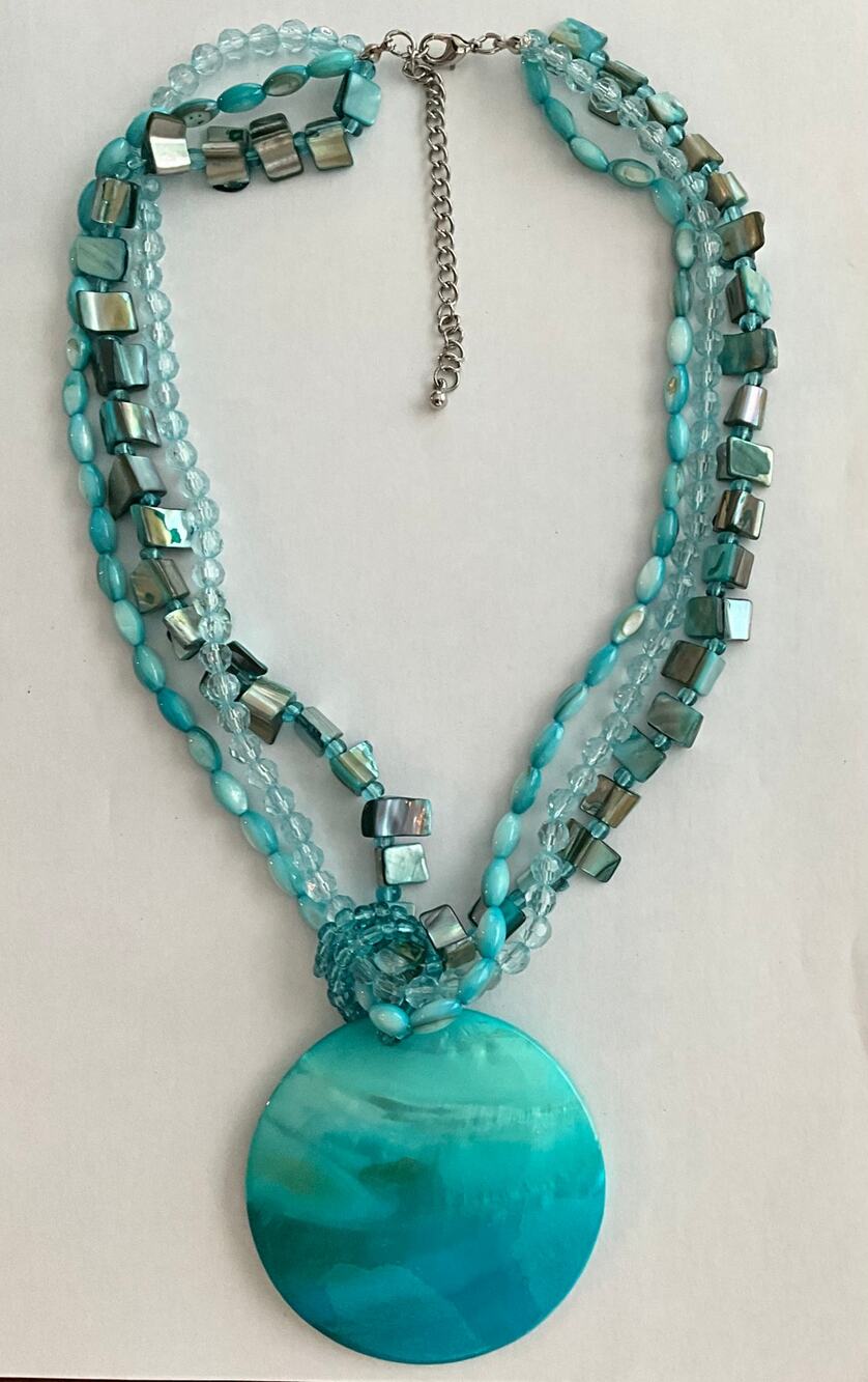 Beaded turquoise color necklace with pendant